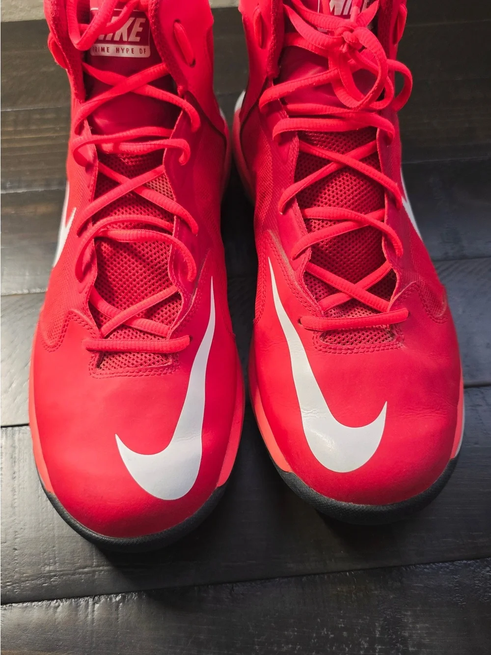 Nike Red High-Top Basketball Shoes with White Swoosh